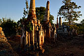 Inle Lake Myanmar. Indein, on the summit of a hill the  Shwe Inn Thein Paya a cluster of hundreds of ancient stupas. Many of them are ruined and overgrown with bushes. 